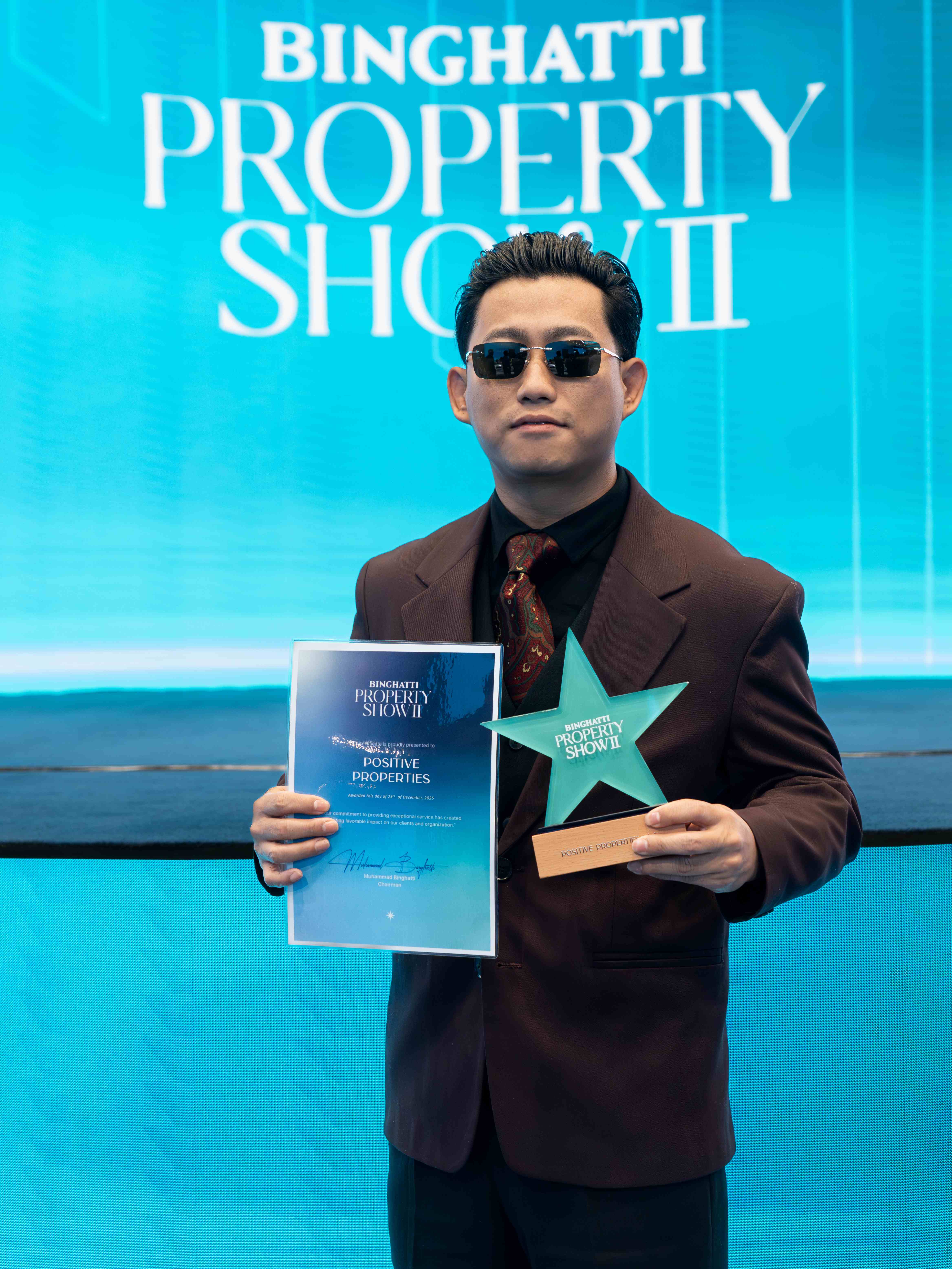 Award winning Dubai real estate agent receiving recognition at Binghatti Property Show II - RERA certified property consultant excellence in luxury Dubai real estate sales